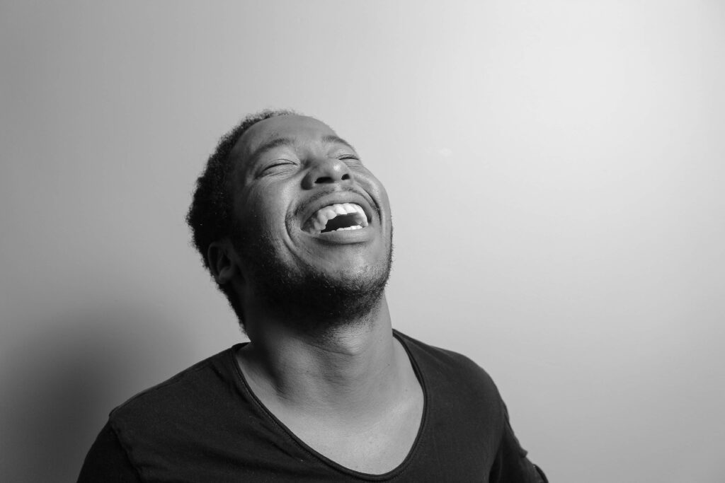 Closeup shot of a man laughing