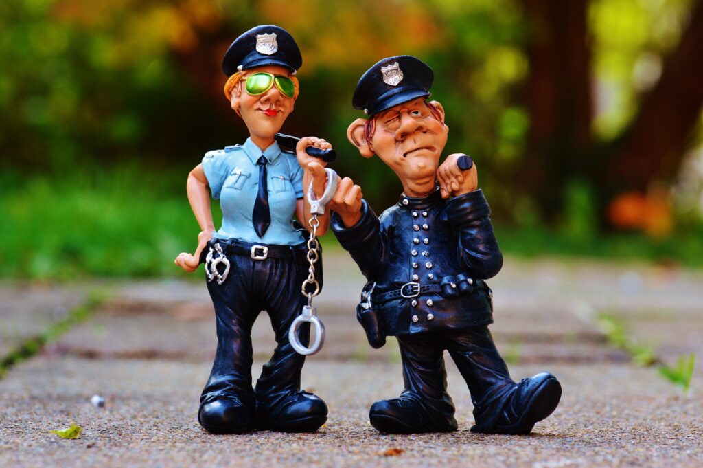 two figurines of police officers